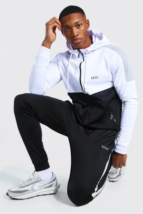 MAN Muscle Fit Colour Block Zip Hooded Tracksuit | boohooMAN UK